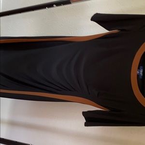 Stunning black dress with brown piping